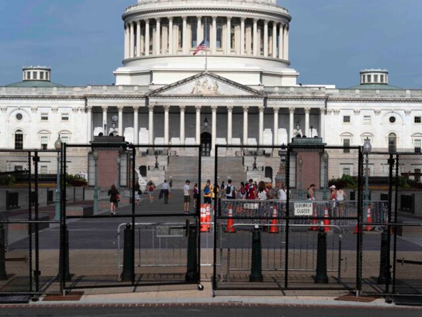 The U.S. Capitol is seen behind a security fence a day before of Israel's Prime Minis