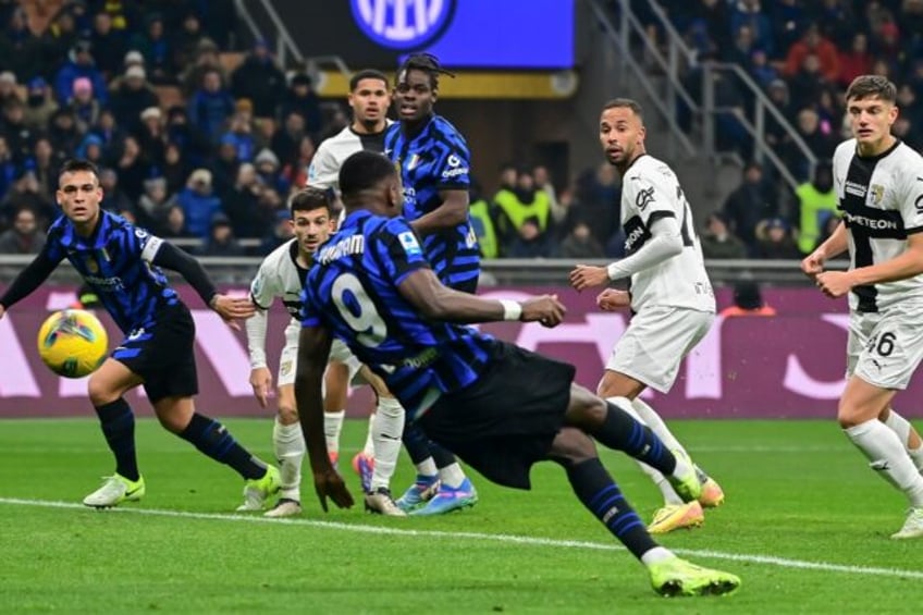 Marcus Thuram (C) scores his 10th Serie A goal of the season against Parma