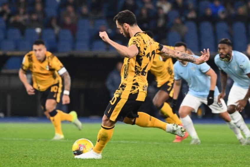 Hakan Calhanoglu started the rout for Inter Milan at Lazio with the penalty which opened t