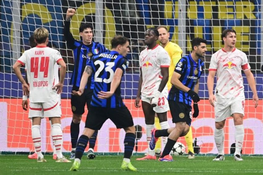 Castello Lukeba (C) reacts to scoring the own goal which gave Inter Milan victory over Lei