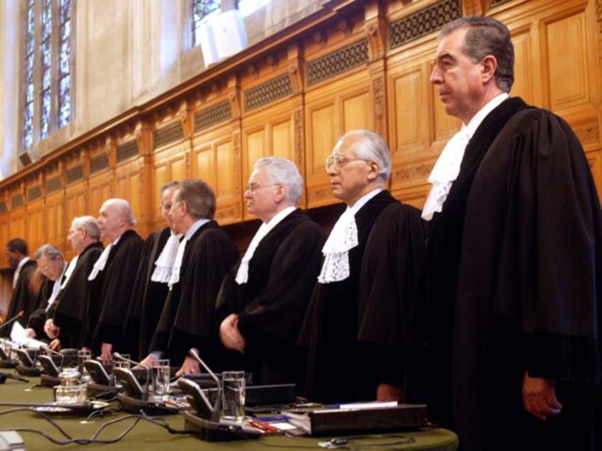 THE HAGUE, NETHERLANDS - DECEMBER 16: The judges of the International Court of Justice arrive December 16, 2003 in The Hague, Netherlands. A dispute is being dealt with between Mexico and the United States in the court concerning alleged violations of Articles 5 and 36 of the Vienna Convention on …