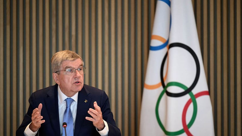 ioc hits russian olympic committee with indefinite suspension after absorbing ukrainian sports councils