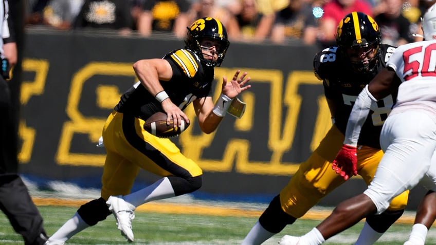 Iowa quarterback runs