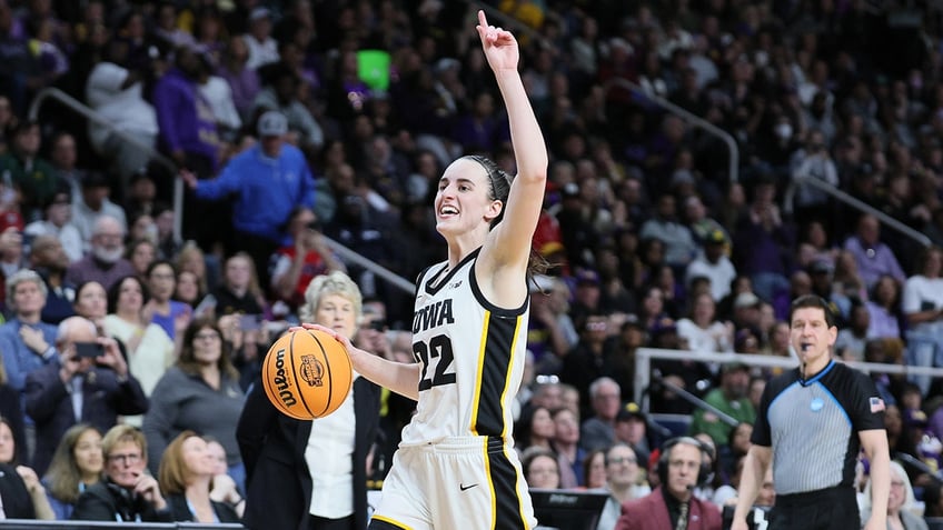 Caitlin Clark celebrates