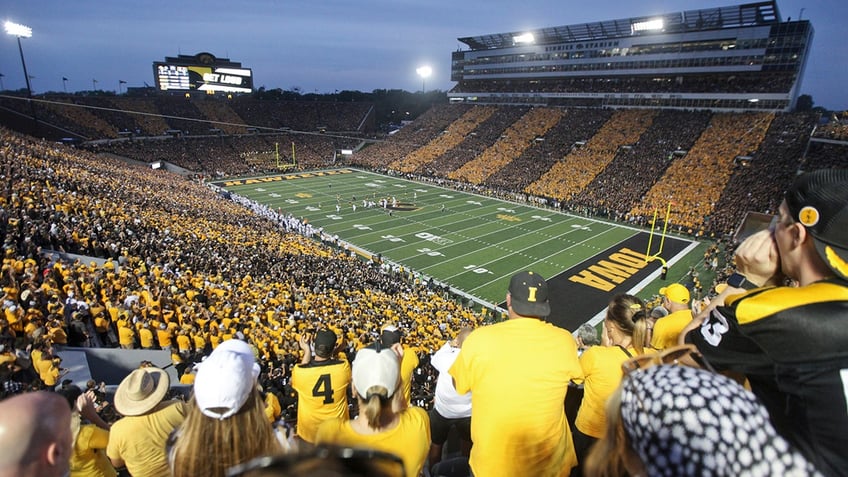 iowa cheerleaders pants fall to ankles during backflip still sticks landing