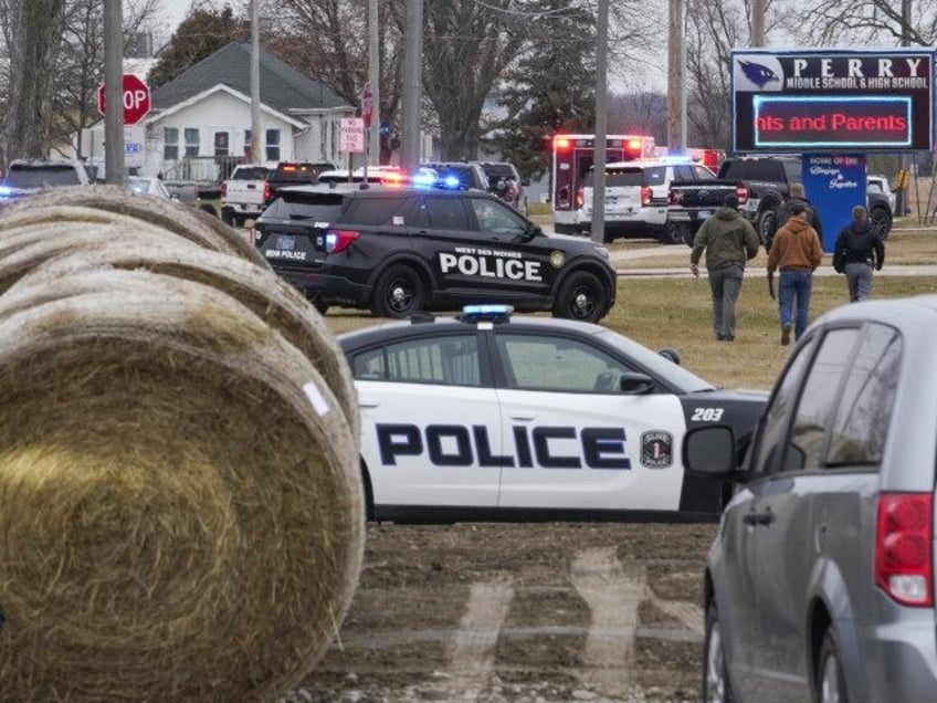 Police respond to Perry High School in Perry, Iowa., Thursday, Jan. 4, 2024. Police say there has been a shooting at the city's high school.(Andrew Harnik/AP)