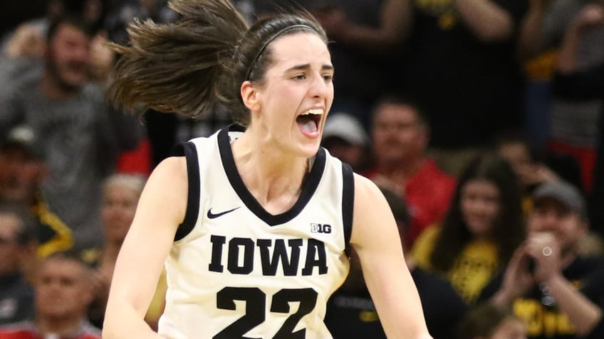 Caitlin Clark celebrates on court