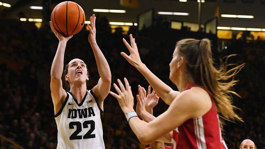 Caitlin Clark shoots over IU player