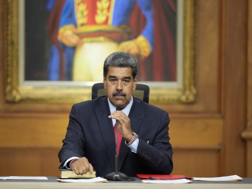 Venezuelan President Nicolas Maduro starts his news conference at Miraflores presidential