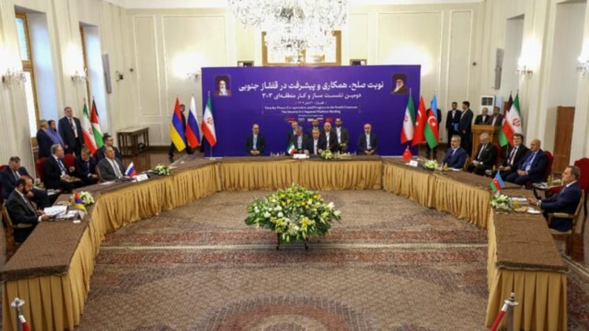 iran and russia denounce west over caucasus tensions