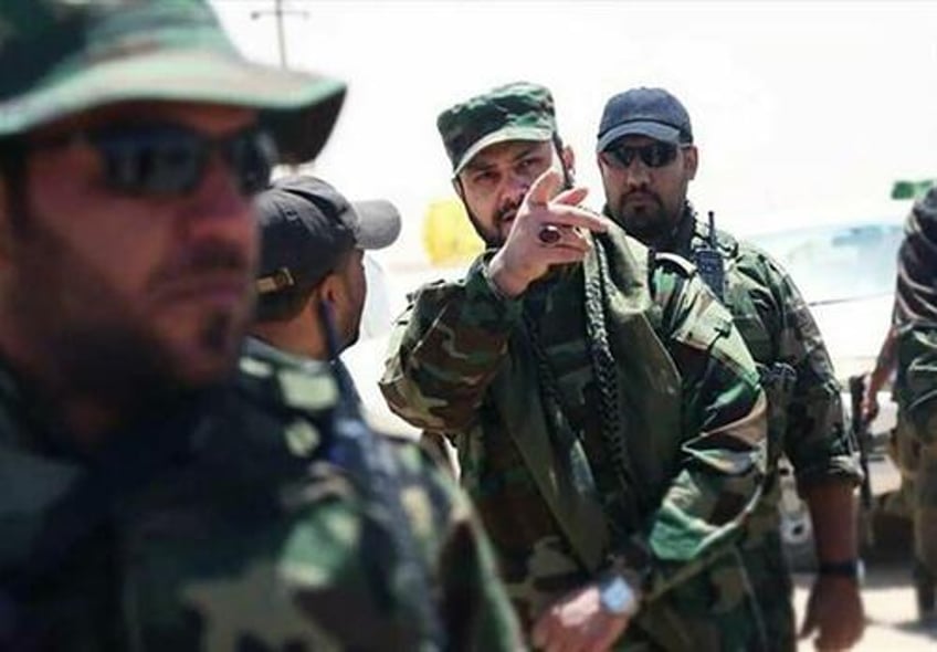 iran backed iraqi militias pour across border into syria to bolster assad