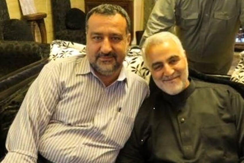 This undated picture released by Iran's Tasnim news agency shows Razi Moussavi (L), a senior adviser for Iran's Islamic Revolutionary Guard Corps (IRGC), alongside IRGC Quds Force commander Qasem Soleimani, who was killed in 2020