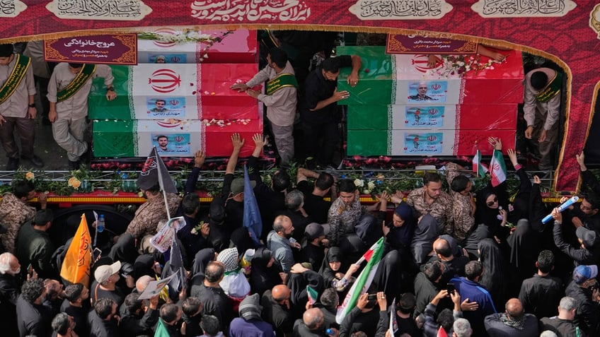 Mourners gather at funeral for Iranian leaders killed in war with Israel