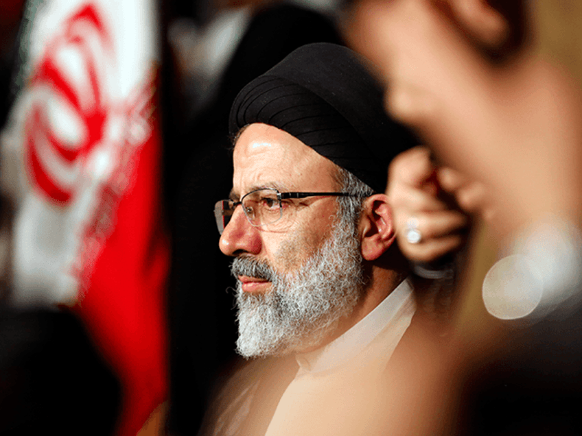 Iranian presidential candidate Ebrahim Raisi looks on during a campaign rally in the capit