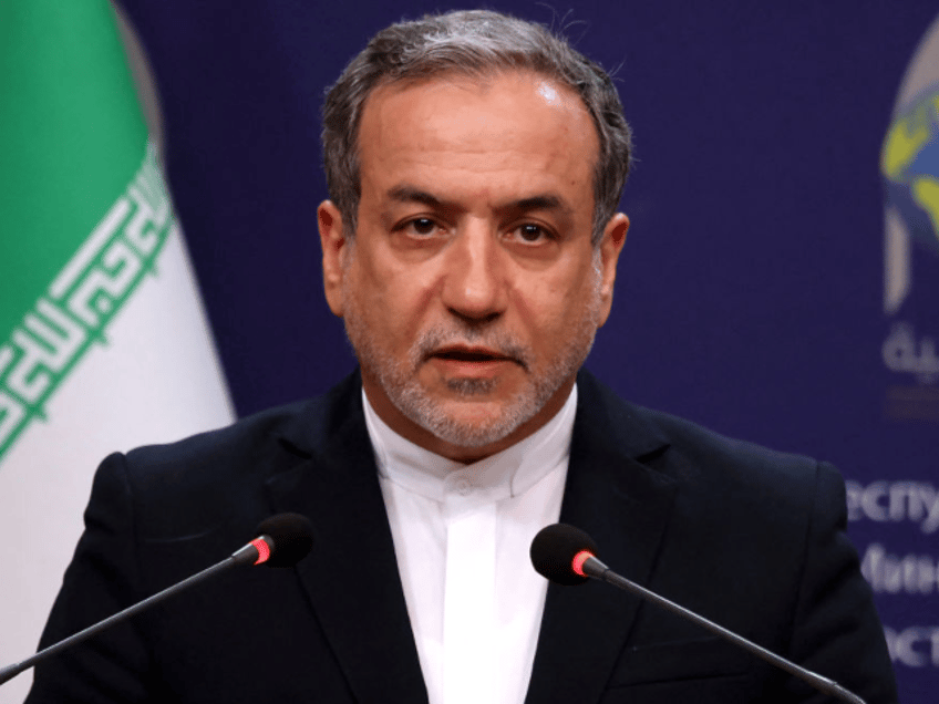 Iranian Foreign Minister Abbas Araghchi attends a press conference with his Syrian and Ira