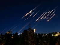 Iran missiles kill 10 in Israel in night of mutual attacks