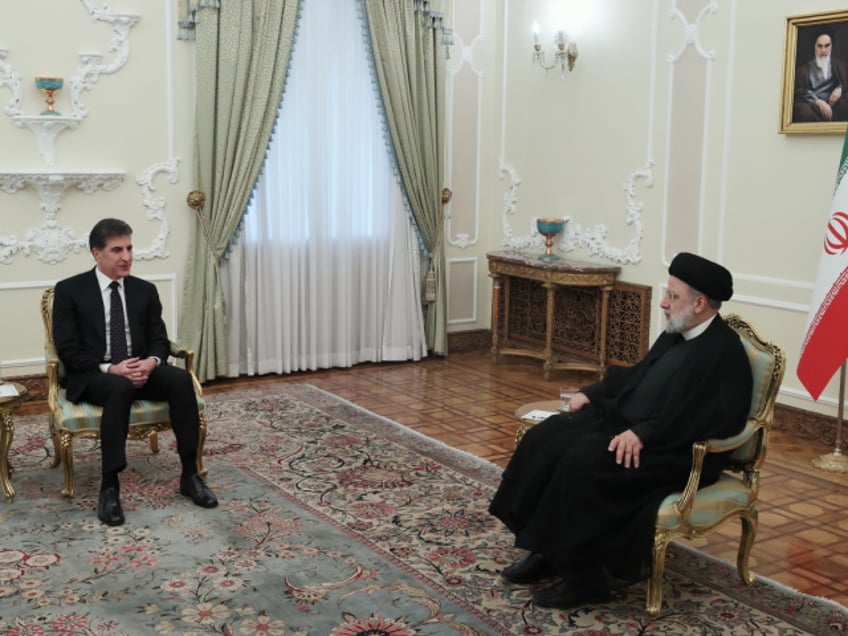 TEHRAN, IRAN - MAY 6: (----EDITORIAL USE ONLY - MANDATORY CREDIT - 'IRANIAN PRESIDENCY / HANDOUT' - NO MARKETING NO ADVERTISING CAMPAIGNS - DISTRIBUTED AS A SERVICE TO CLIENTS----) Iranian President Ebrahim Raisi (R) meets with Kurdish Regional Government (KRG) head Nechirvan Barzani (L) in Tehran, Iran on May 6, 2024. (Photo by Iranian Presidency/Anadolu via Getty Images)