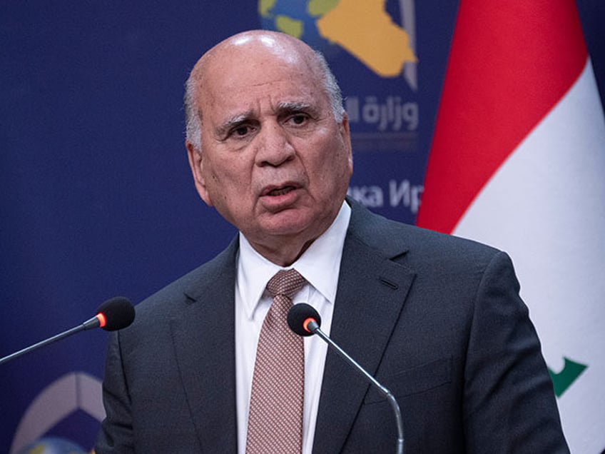 Iraqi Foreign Minister Fouad Hussein addresses journalists during a joint news conference