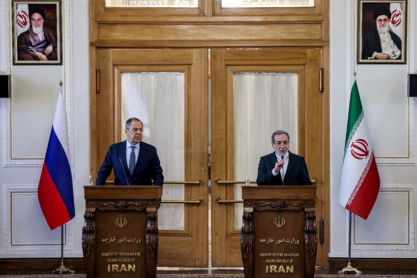 Iran's Foreign Minister Abbas Araghchi (R) ruled out direct nuclear talks with the US duri