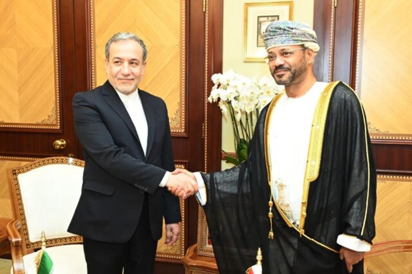 A handout picture provided by the Oman News Agency showing Oman's Foreign Minister Sayyid