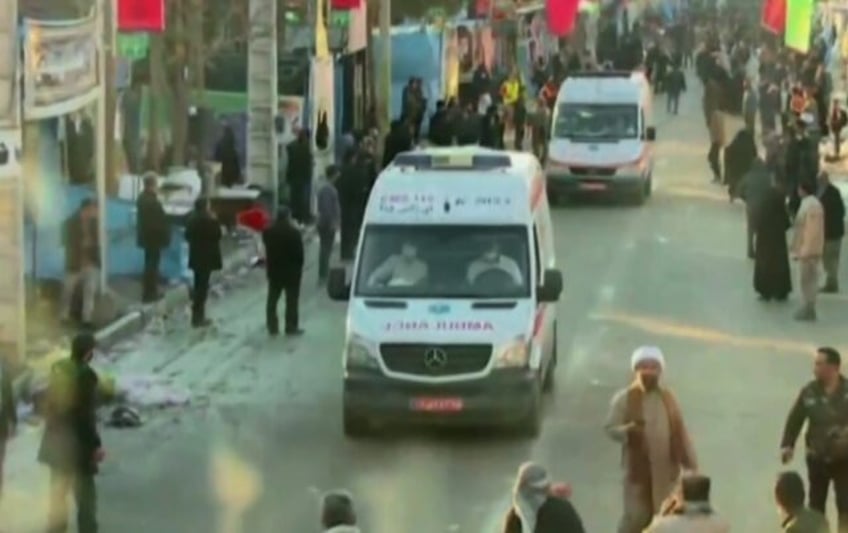 Video released by state-run Iran Press news agency on January 3, 2024 shows ambulances leaving the site where two explosions struck a crowd marking the anniversary of the 2020 killing of Guards general Qasem Soleimani