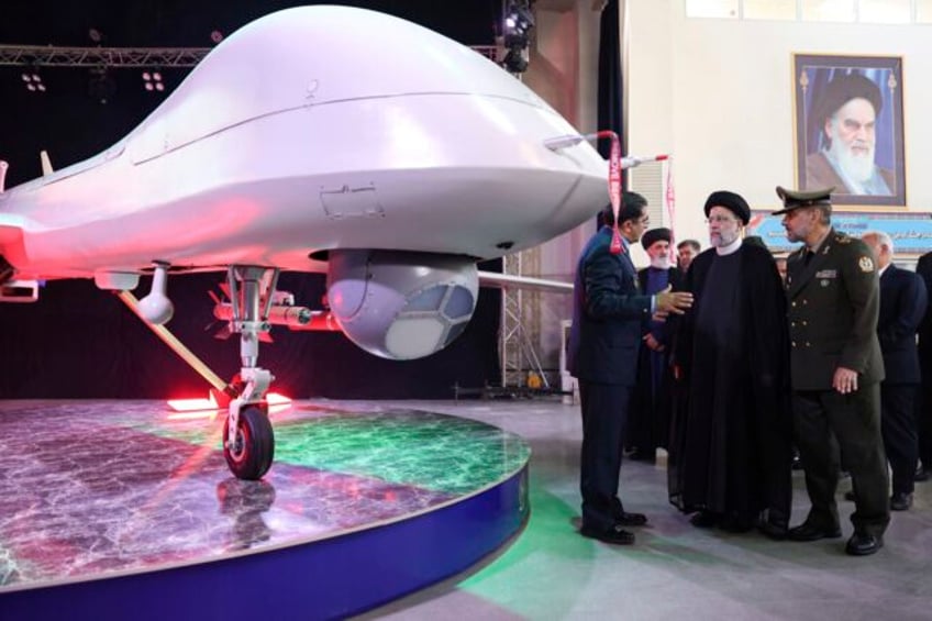 iran unveils armed drone resembling americas mq 9 reaper and says it could potentially reach israel