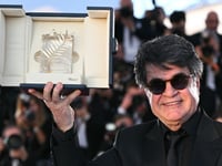 Iranian filmmaker Panahi urges ‘freedom’ as he wins Cannes top prize