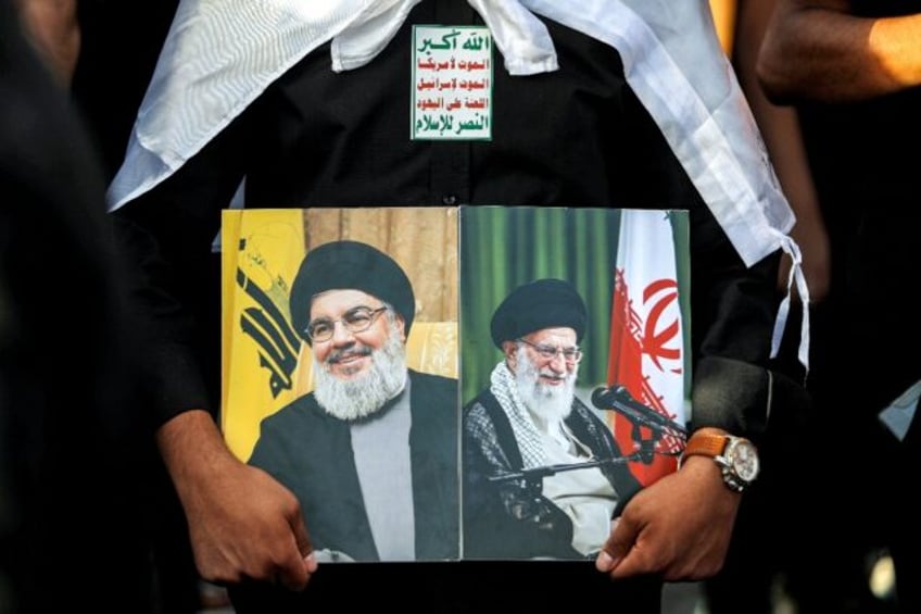 Iran's Supreme Leader Ayatollah Ali Khamenei (R) will commemorate Hezbollah leader Hassan