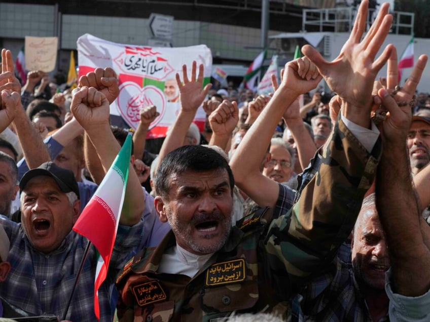 irans president responds to us at rally in tehran revenge revenge