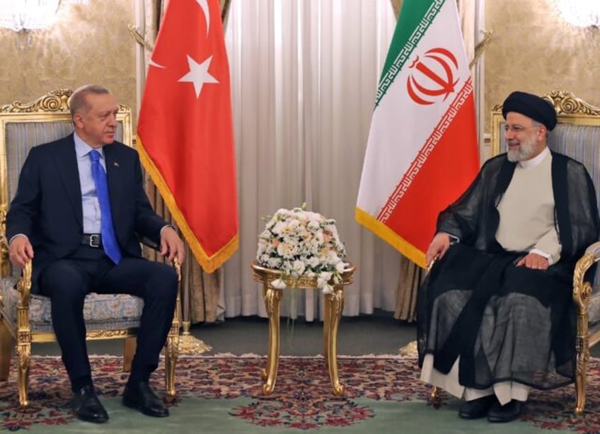 Turkish President Recep Tayyip Erdogan (L) visited Iranian counterpart Ebrahim Raisi in Tehran in 2022