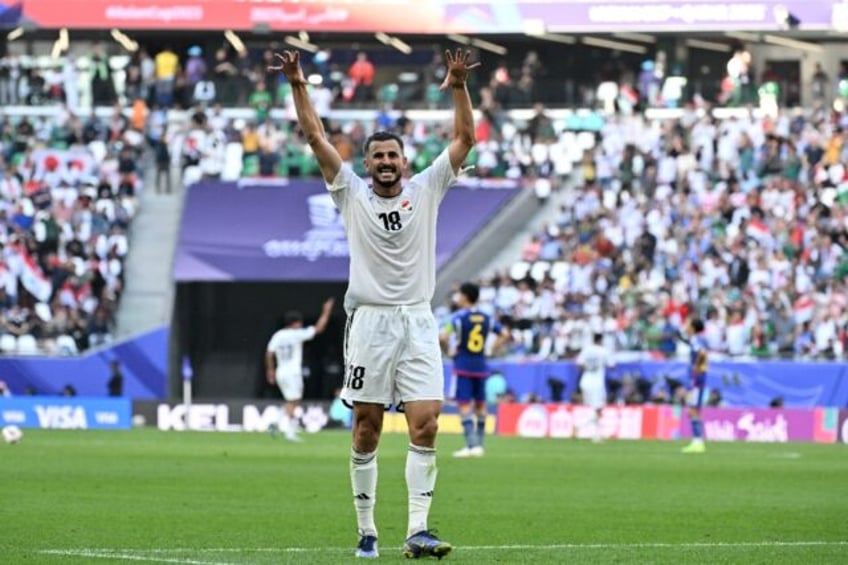 Aymen Hussein scored two first-half headers for Iraq