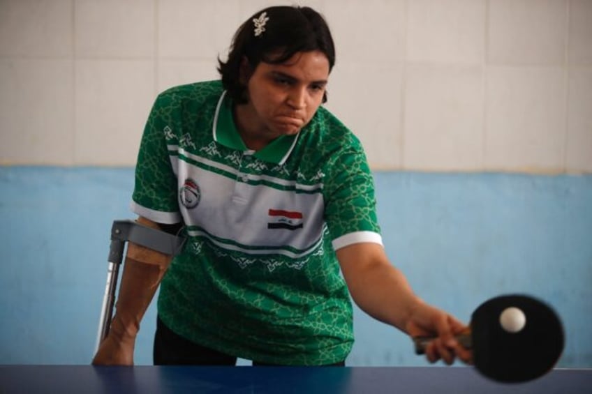 Iraqi paralympics table tennis player Najlah Imad training for the Paris Games at the Al-M