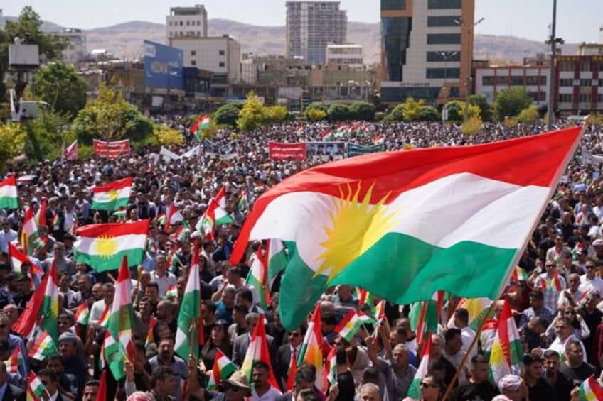 iraqi kurds protest unpaid salaries from baghdad