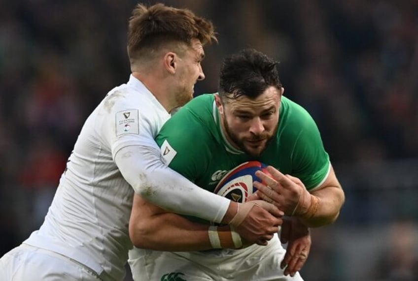 Ireland centre Robbie Henshaw in action against England