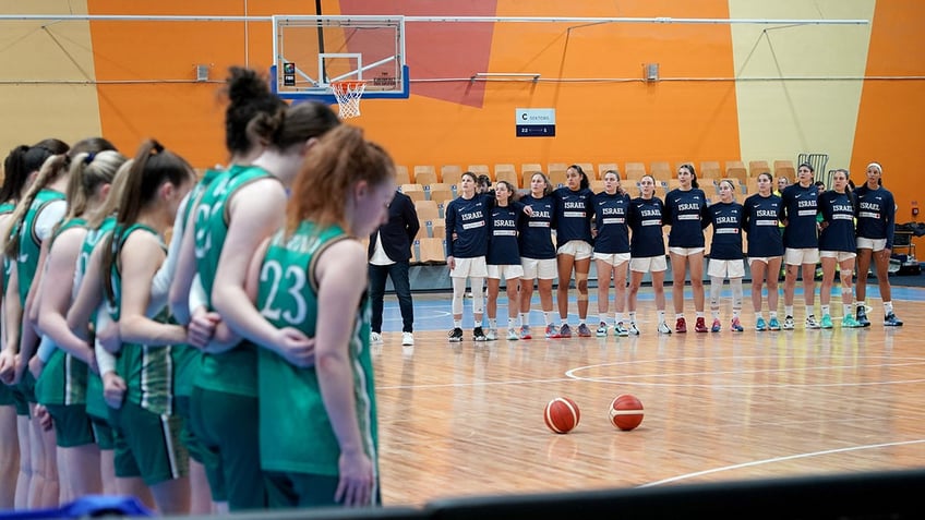 team ireland stands by there bench