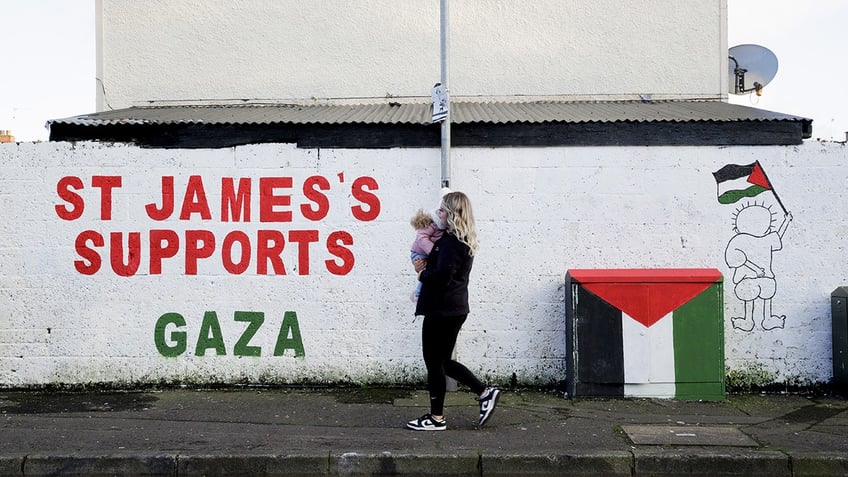 irish lives matter graffiti in belfast signs against rehousing illegal migrants spark hate probe report