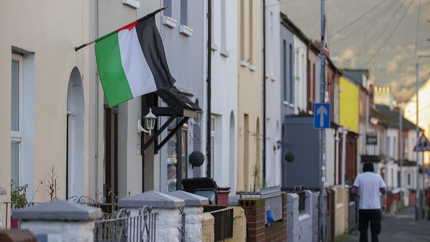 irish lives matter graffiti in belfast signs against rehousing illegal migrants spark hate probe report