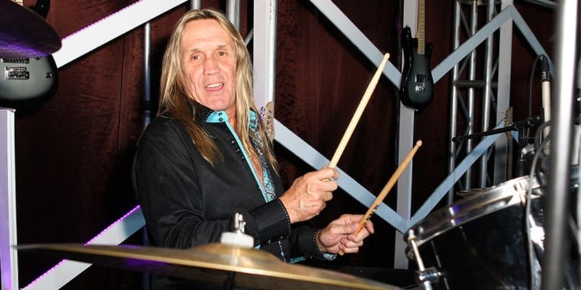 iron maiden drummer left paralyzed by stroke by the grace of god im getting better