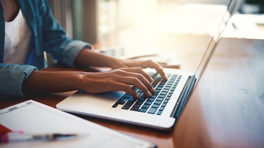 worker at laptop