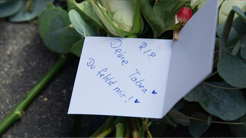 Flowers at memorial of stabbing