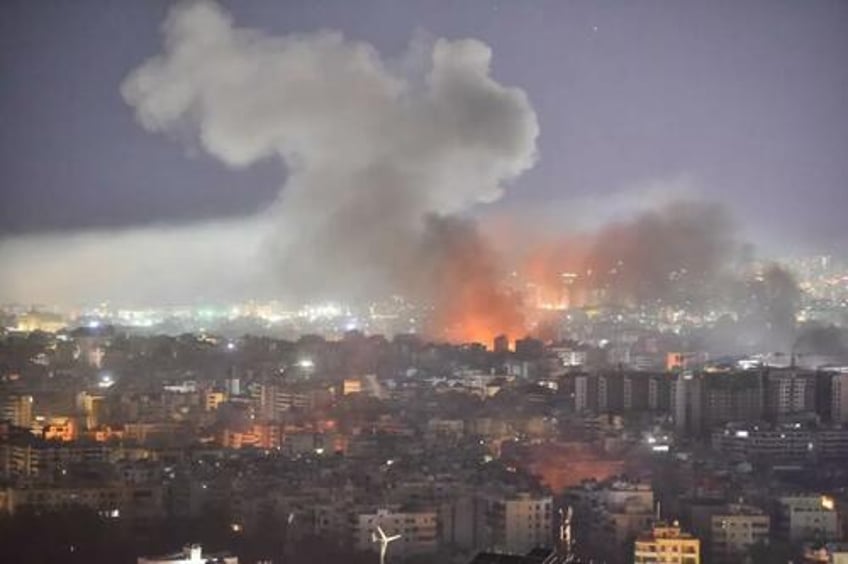 israel accused of using phosphorus bombs in rare central beirut strikes near parliament