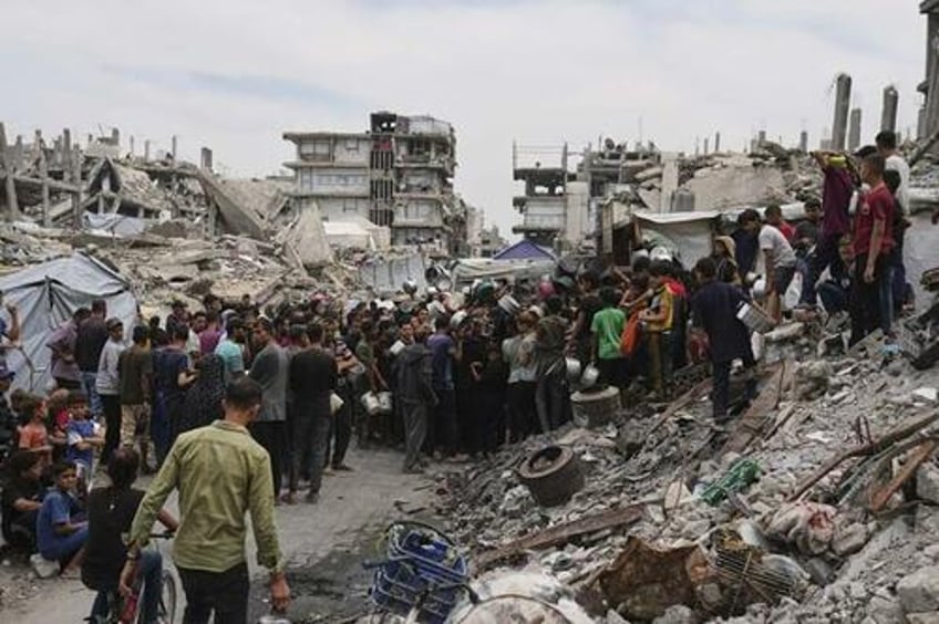 israel allows aid into gaza as who warns 500000 on brink of starvation