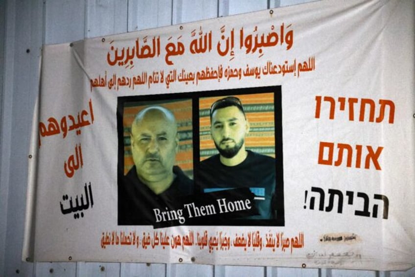 A banner calling for the release of Bedouin Arab hostages Youssef and Hamza al-Zayadna in