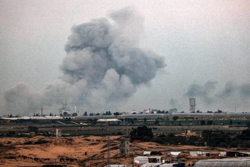 Smoke billows over the southern Gaza Strip during an Israeli bombardment on Sunday