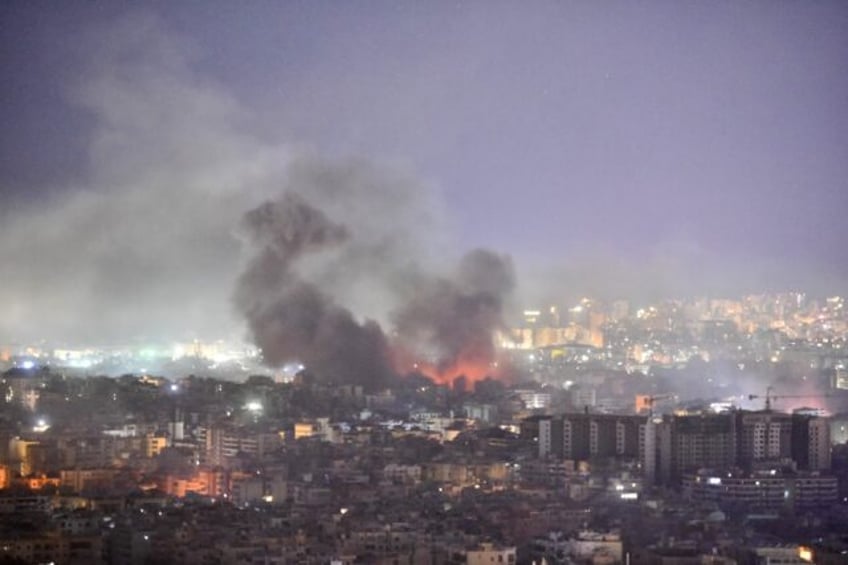 Smoke and flames rise over southern Beirut after an Israeli air strike