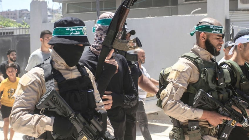 Hamas terrorists seen during the funeral of four members. The Israeli Air Force carried out an air strike on the Nour Shams refugee camp near Tulkarm in the West Bank on July 3, 2024.