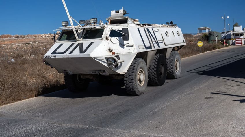 MARJAYOUN, LEBANON - OCTOBER 5: A UNIFIL (United Nations Interim Force In Lebanon) armoured personnel carrier departs a base to patrol near the Lebanon-Israel border on October 5, 2024 in Marjayoun, Lebanon. Israel continued airstrikes on Beirut and its southern suburbs as its military announced a ground offensive in Lebanon, part of what it said would be a "limited" incursion to target Hezbollah forces. Photo: Carl Court/Getty Images