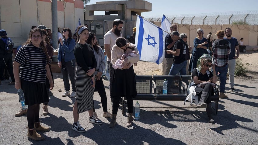 People gather at Israel's Nitzana border