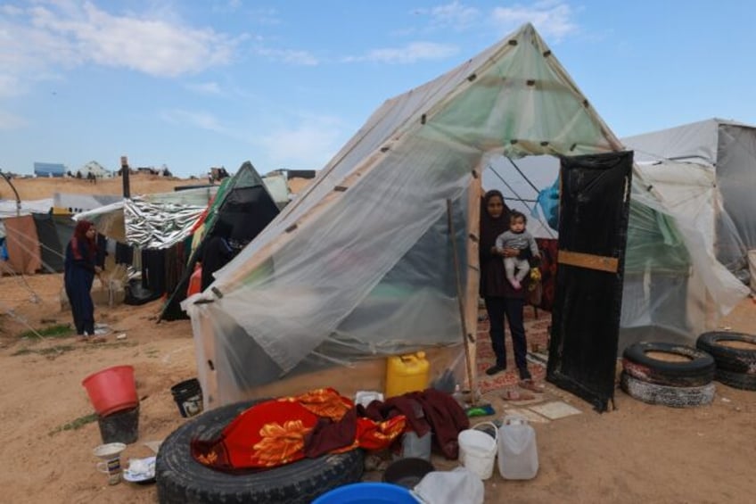 Hundreds of thousands of people have been driven into Rafah, seeking shelter in a sprawlin