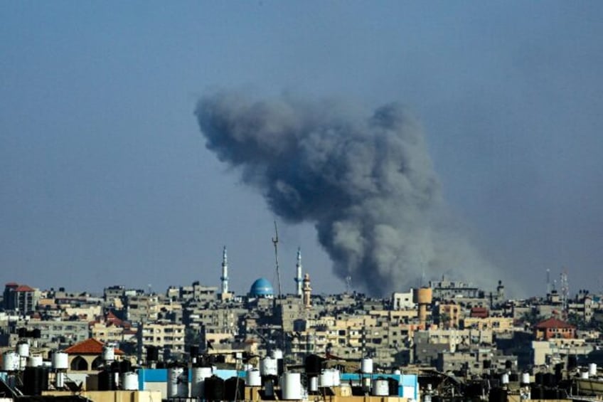 Smoke billows following Israeli bombardment in Rafah in the southern Gaza Strip on May 25,